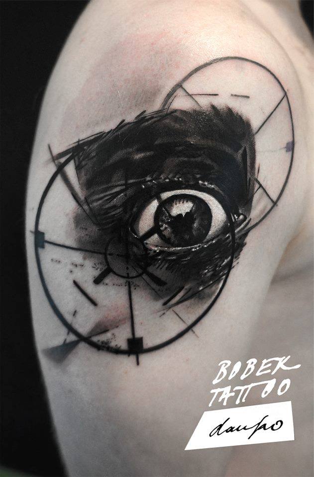 Black Ink Eye Tattoo On Man Right Shoulder