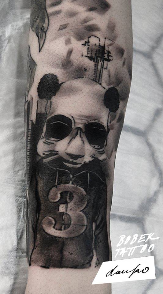 Black Ink Gentleman Panda Tattoo On Left Sleeve