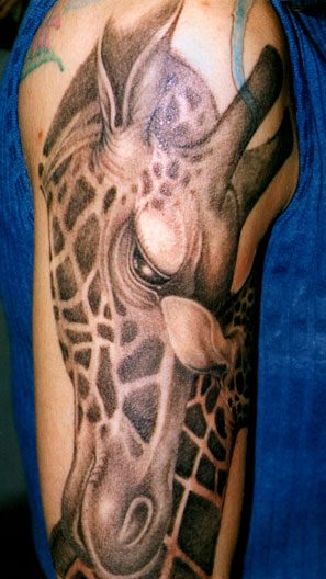 Black Ink Giraffe Head Tattoo On Half Sleeve By Tom Renshaw
