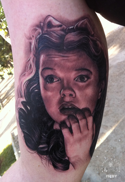 Black Ink Girl Face Portrait Tattoo On Right Bicep By Fredy