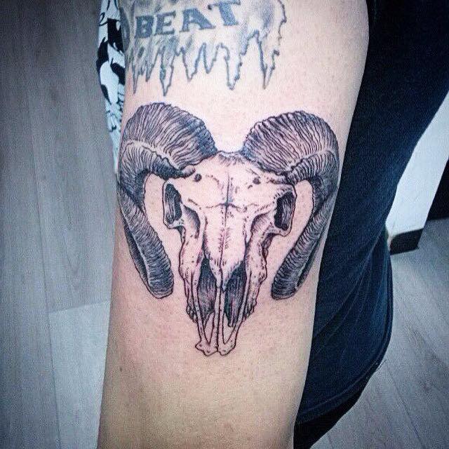 Black Ink Goat Skull Tattoo On Left Half Sleeve