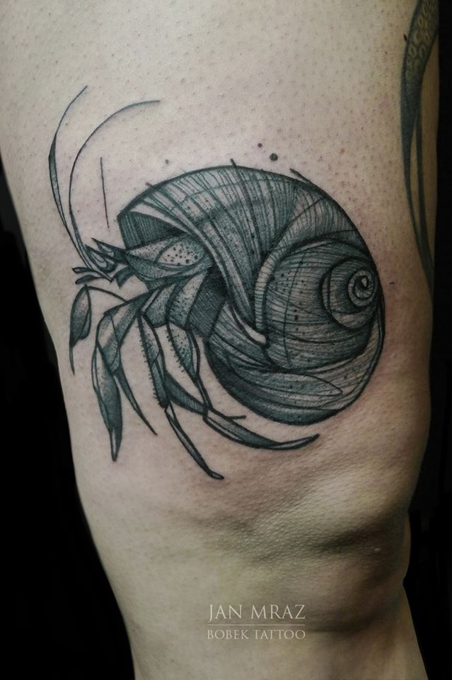 Black Ink Hermit Crab Tattoo On Left Half Sleeve