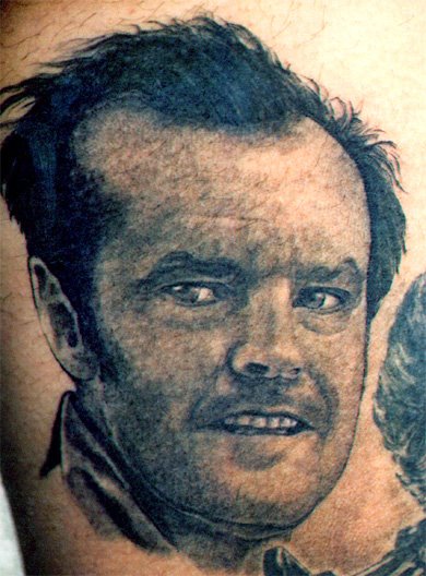 Black Ink Jack Nicholson Portrait Tattoo Design For Half Sleeve