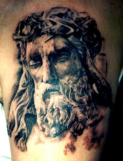 Black Ink Jesus Christ Tattoo On Left Shoulder