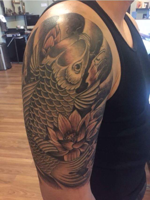 Black Ink Koi Fish With Lotus Flowers Tattoo On Right Half Sleeve