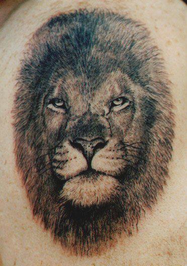 Black Ink Lion Head Tattoo Design By Tom Renshaw
