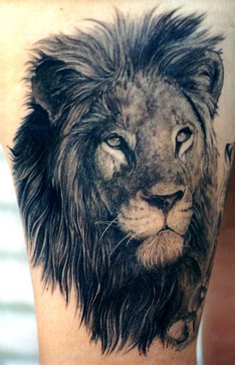 Black Ink Lion Head Tattoo On Half Sleeve