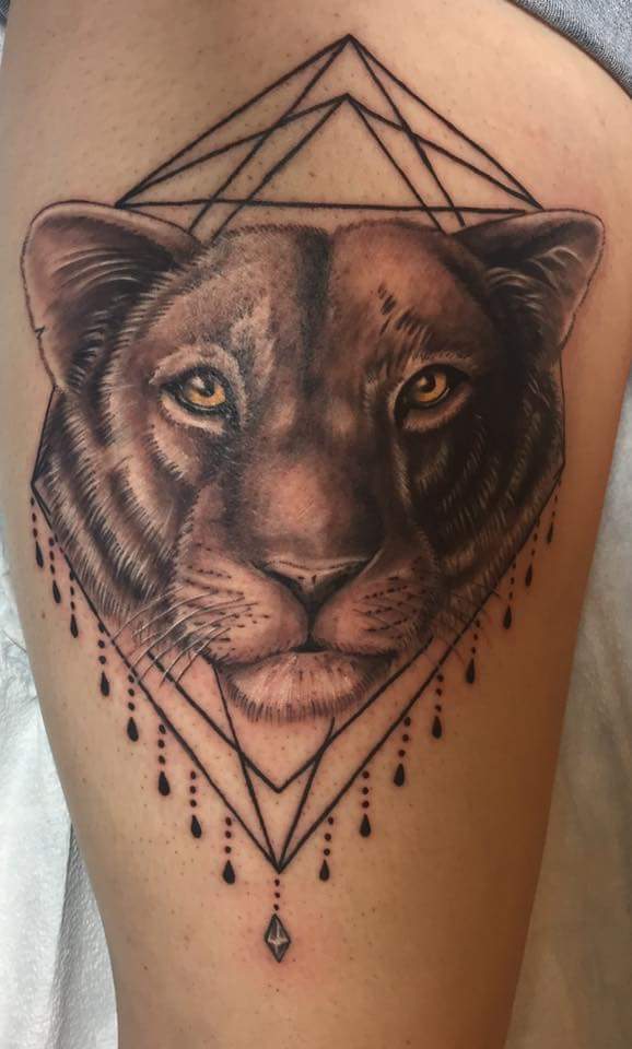 Black Ink Lioness Head Tattoo Design For Half Sleeve