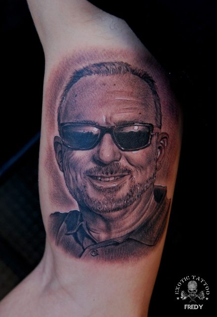 Black Ink Man Face Portrait Tattoo On Right Bicep By Fredy