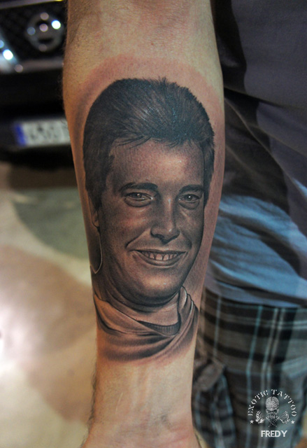 Black Ink Man Face Portrait Tattoo On Right Forearm