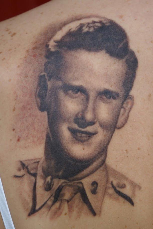 Black Ink Man Portrait Tattoo On Left Back Shoulder By Tom Renshaw