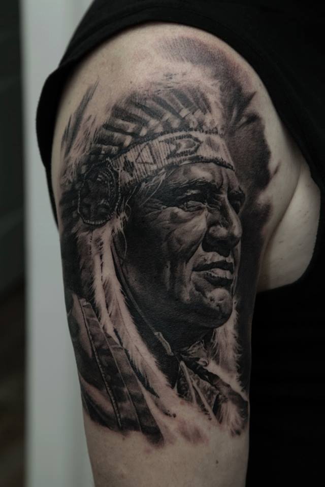 Black Ink Native Man Face Tattoo On Right Half Sleeve