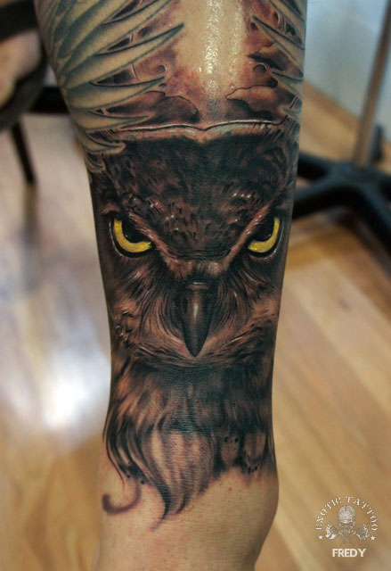 Black Ink Owl Tattoo On Left Half Sleeve By Fredy
