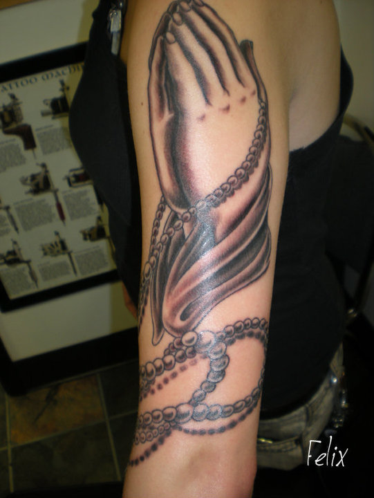 Black Ink Praying Hands With Rosary Cross Tattoo On Women Left Half Sleeve
