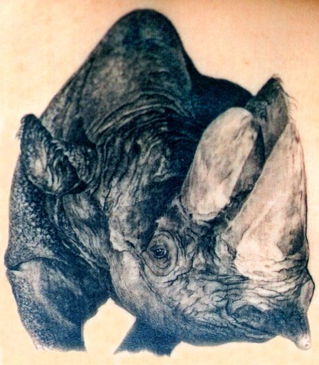 Black Ink Rhino Tattoo Design