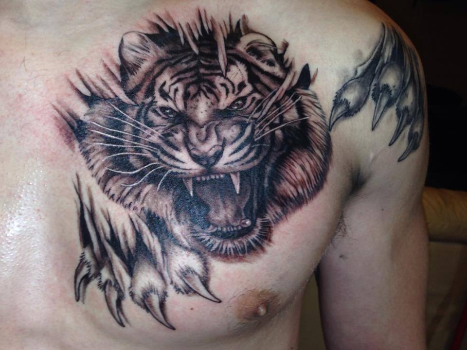 Black Ink Roaring Lion Head Tattoo On Left Front Shoulder