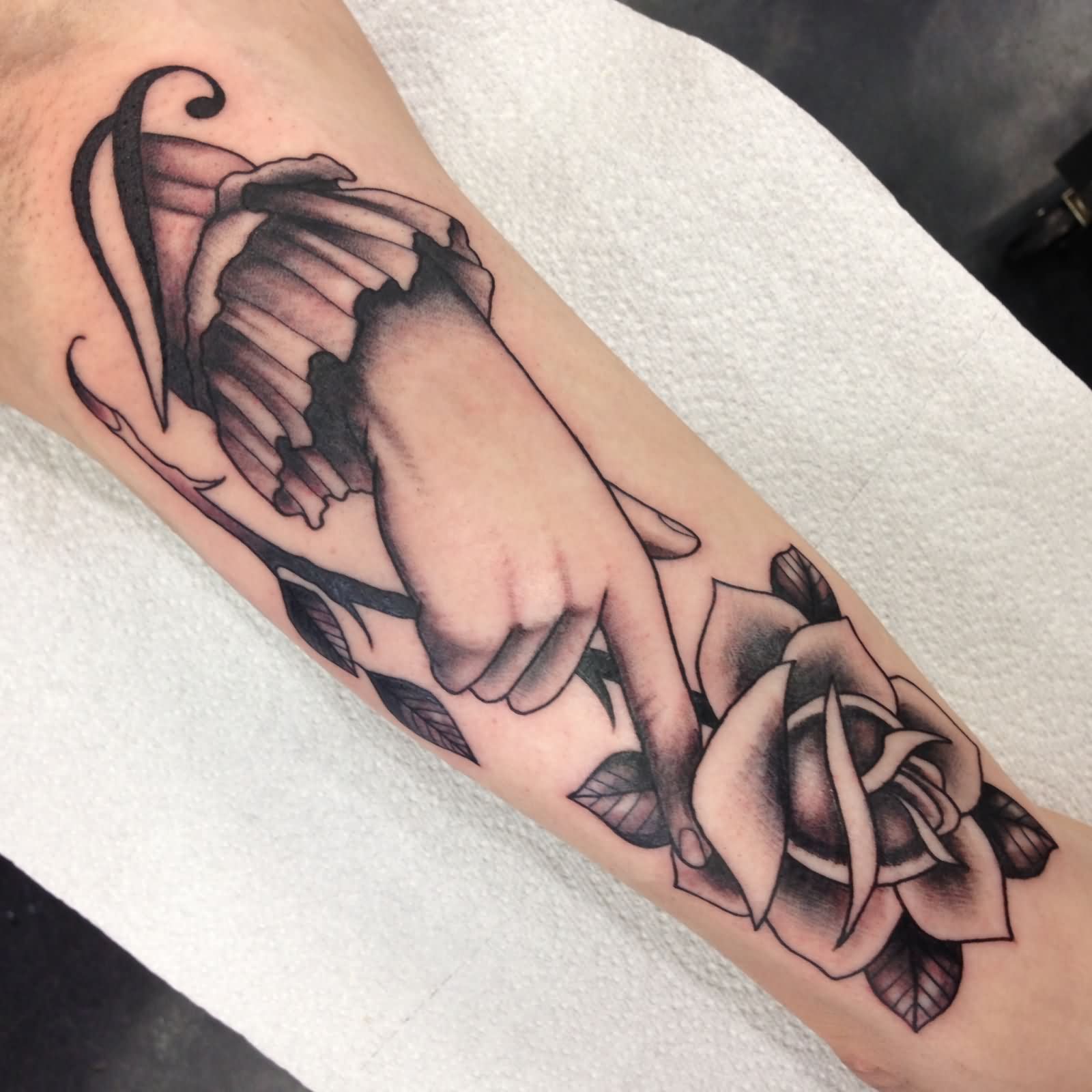 Black Ink Rose Tattoo On Forearm