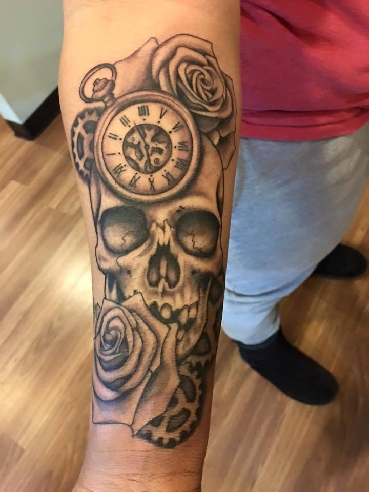 Black Ink Skull With Pocket Watch And Roses Tattoo On Right Forearm By Zak Schulte