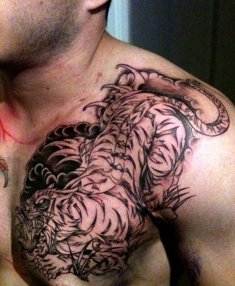 Black Ink Tiger Tattoo On Man Left Front Shoulder