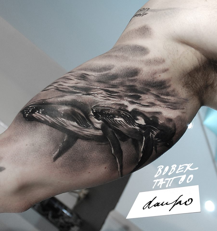 Black Ink Two Whale Tattoo On Right Bicep By Dan Ko