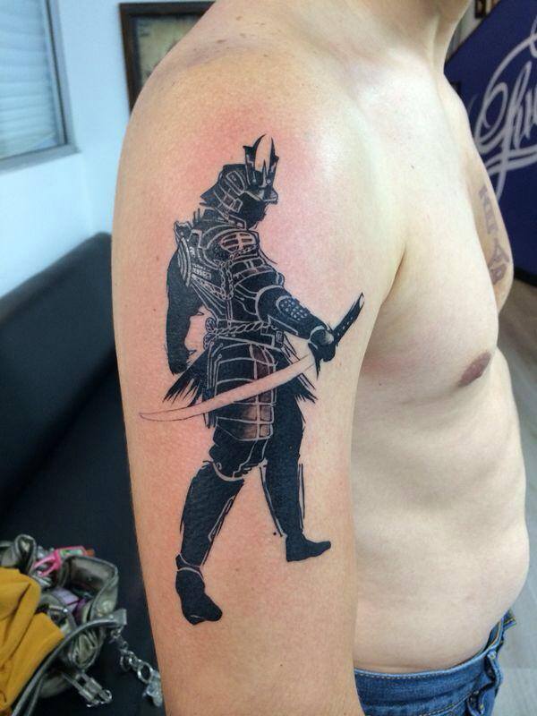 Black Ink Warrior Tattoo On Man Right Half Sleeve By Pig Legion