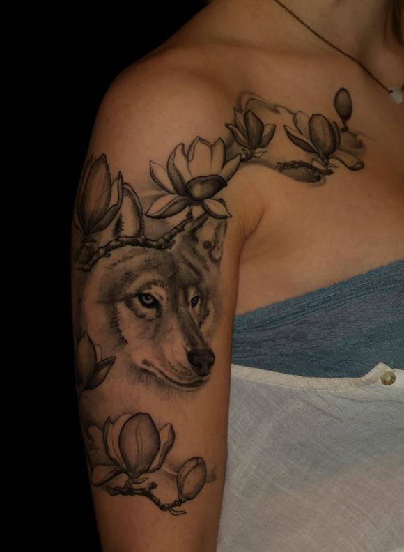 Black Ink Wolf Head With Lotus Tattoo On Right Half Sleeve
