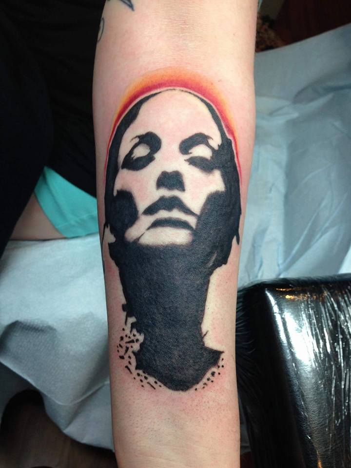 Black Ink Women Face Tattoo On Right Forearm