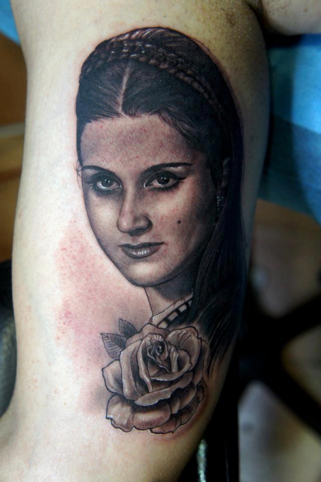 Black Ink Women Face With Rose Tattoo On Half Sleeve