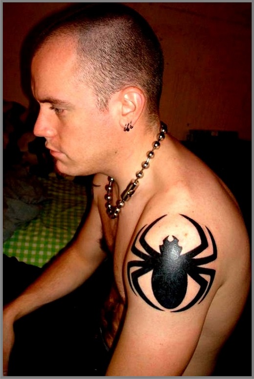 Black Silhouette Spider Tattoo On Left Shoulder