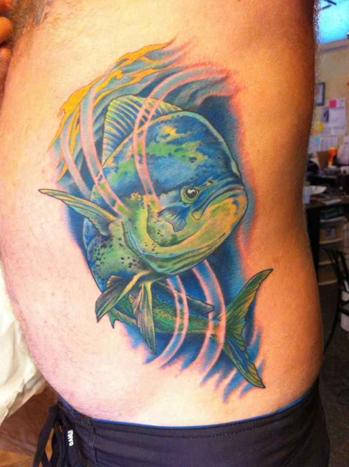 Blue And Green Fish Tattoo On Man Left Side Rib