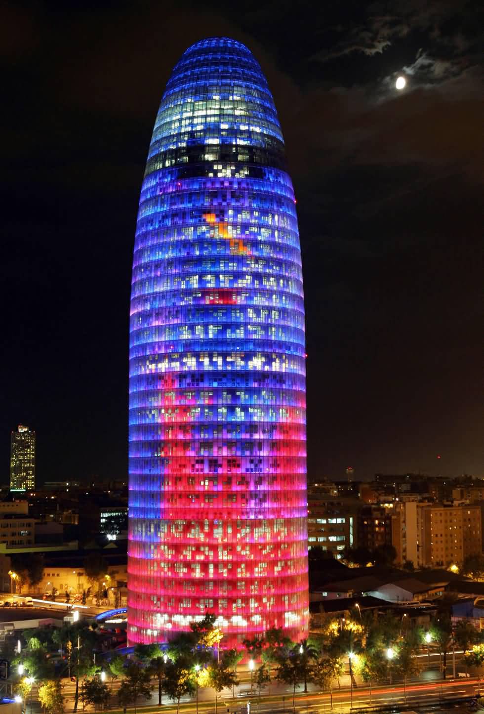 Blue And Pink Lights On Torre Agbar At Night