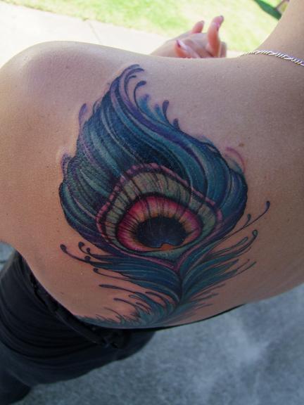 Blue Ink Peacock Feather Tattoo On Back