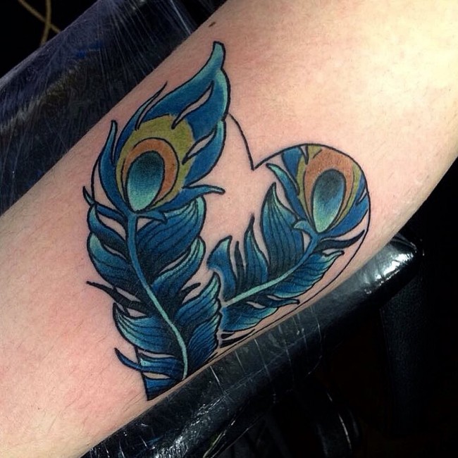 Blue Ink Peacock Feathers Tattoos On Leg