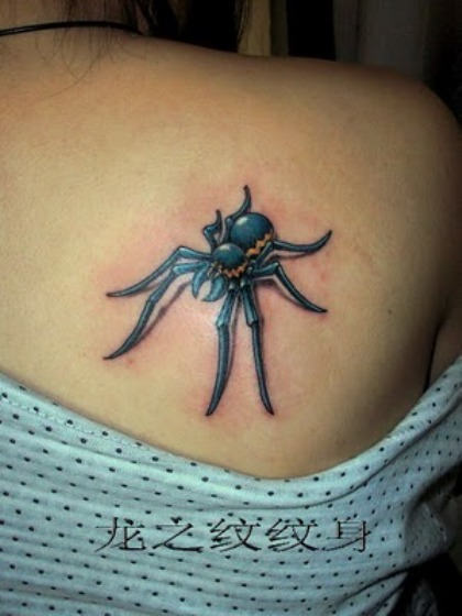 Blue Ink Spider Tattoo On Girl Back Shoulder