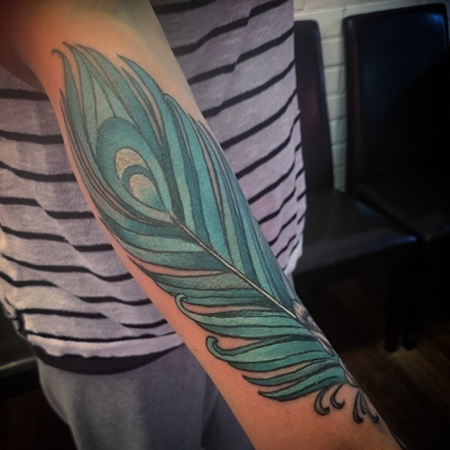 Blue Peacock Feather Tattoo On Arm Sleeve