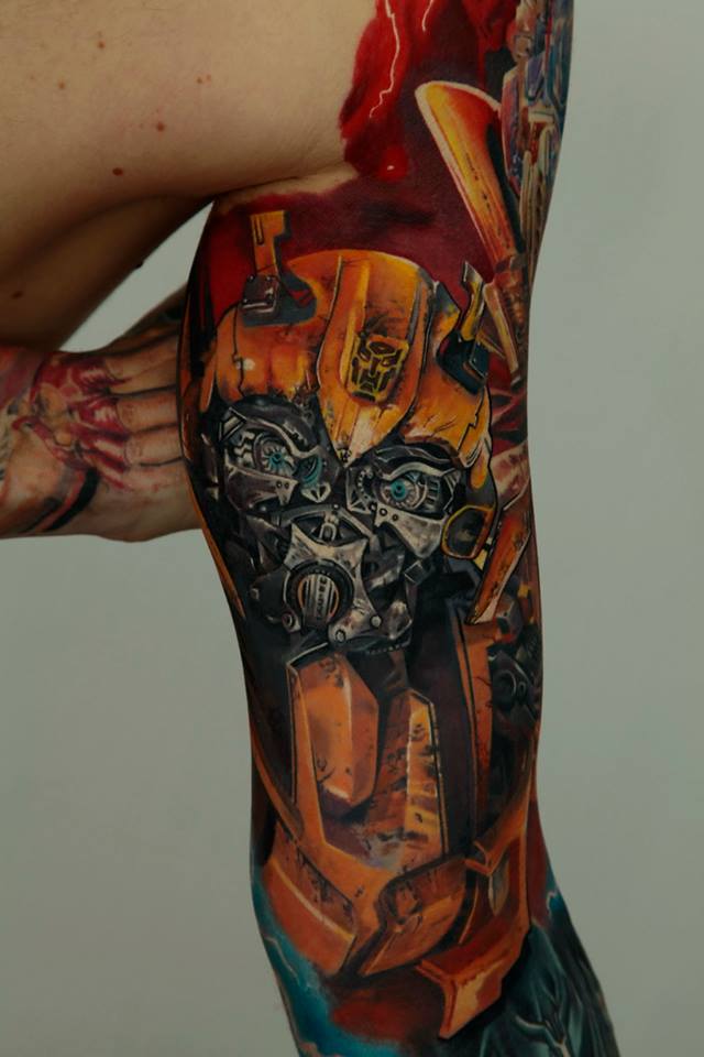 Bumblebee Transformer Tattoo On Bicep By Dmitriy Samohin
