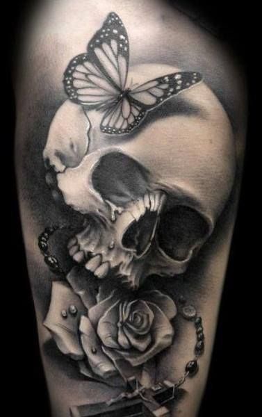 Butterfly And Skull With Rose Tattoo On Arm