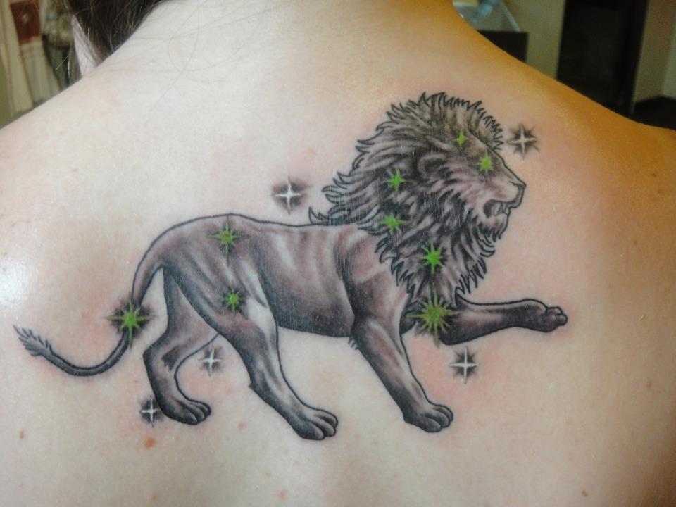 Classic Black Ink Lion Tattoo On Upper Back