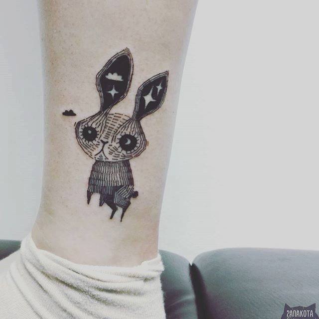 Classic Black Ink Rabbit Tattoo On Leg