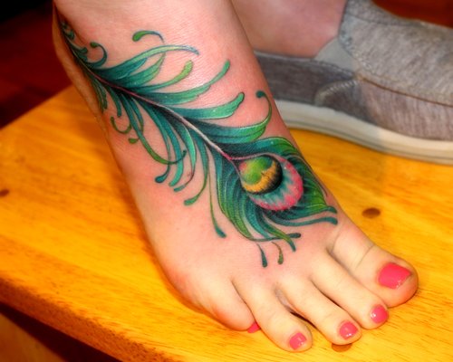 Colored Peacock Tattoo On Girl Right Foot