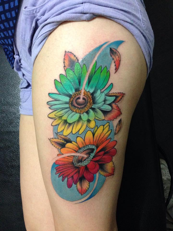 Colorful Flowers Tattoo On Left Thigh By Pig Legion