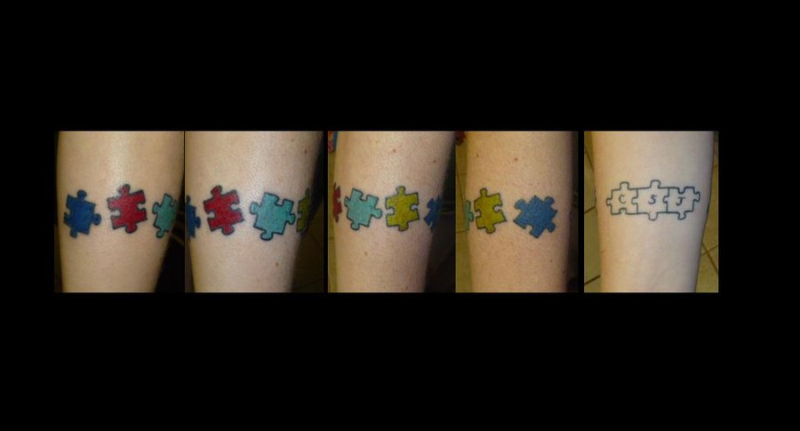 Colorful Puzzle Pieces Tattoo On Leg