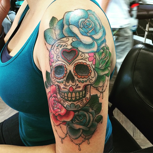 Colorful Roses And Sugar Skull Tattoo On Left Half Sleeve