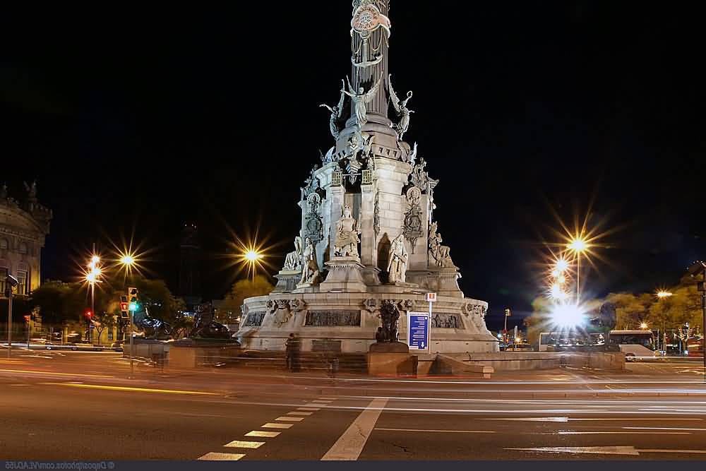 Columbus Monument Illuminated By Night In Barcelona