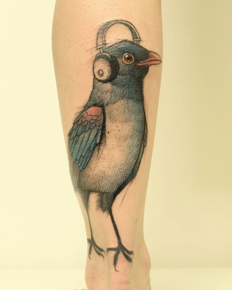 Cool Bird With Headphone Tattoo On Leg By Jan Mraz