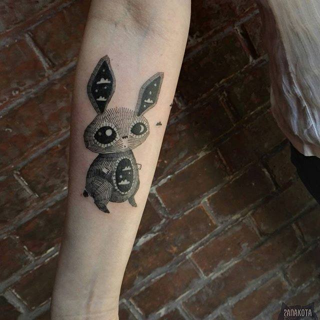 Cool Black Ink Rabbit Tattoo On Right Forearm By Panakota