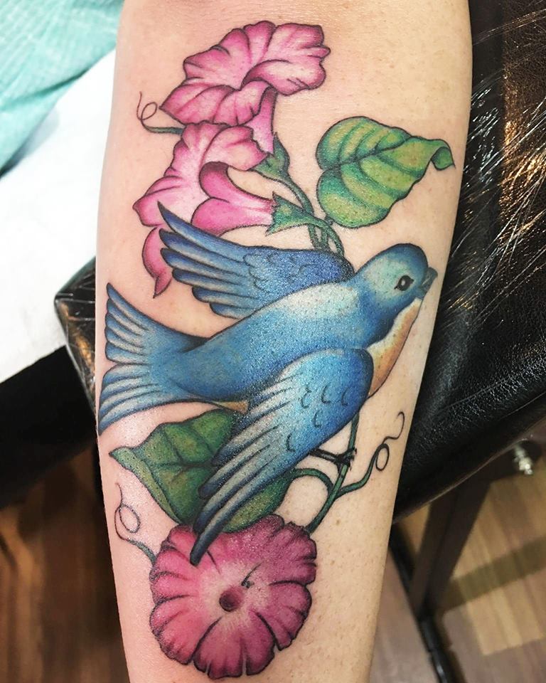 Cool Flying Bird With Flowers Tattoo On Forearm