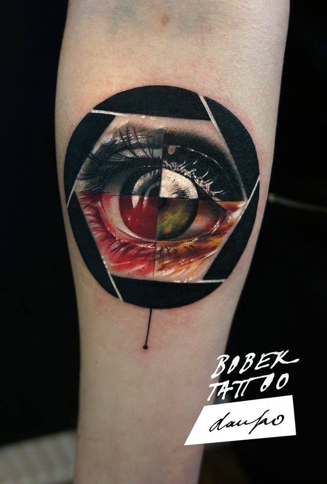 Cool Human Eye In Camera Lens Tattoo On Eye