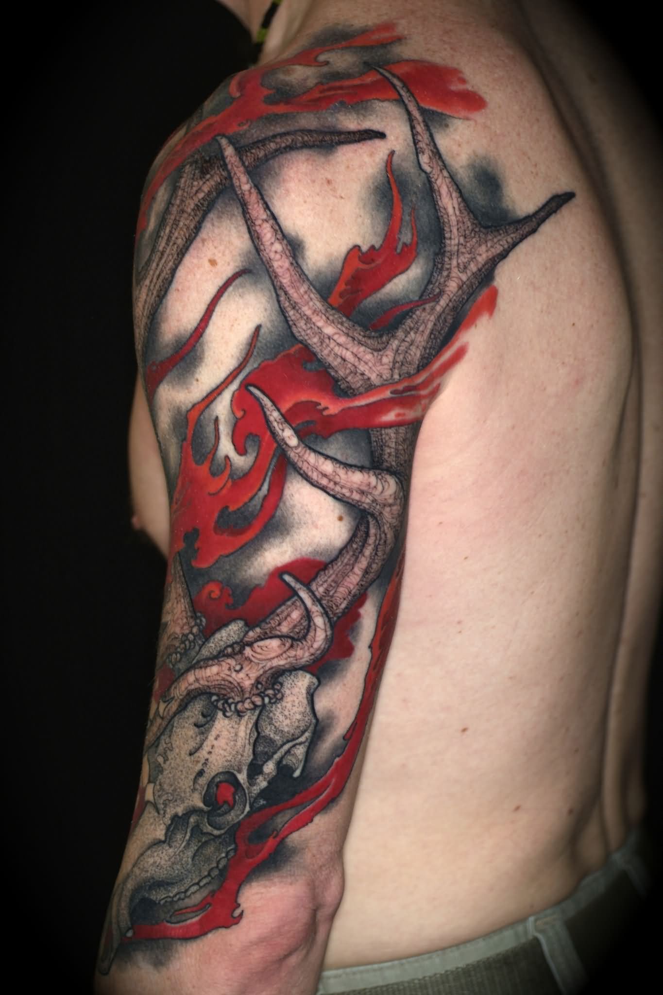 Deer Skull Tattoo On Man Left Half Sleeve