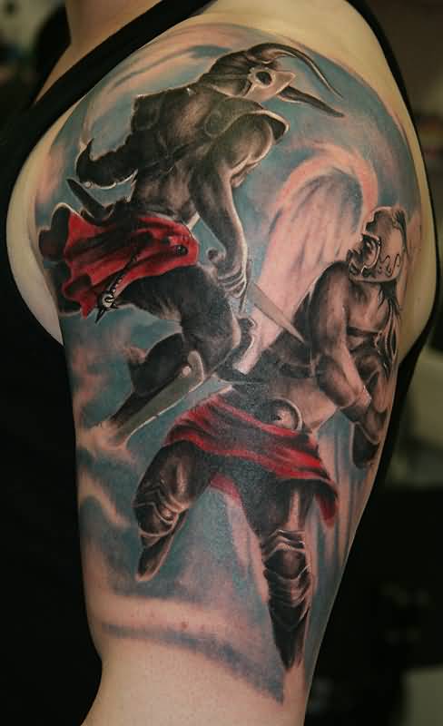Devil And Angel Fighting Tattoo On Left Shoulder
